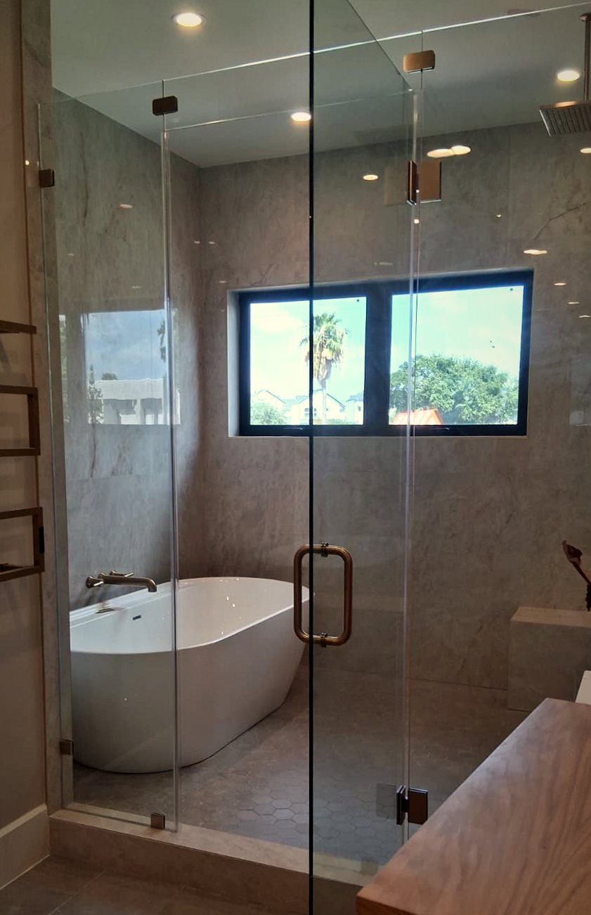 Glass shower & freestanding tub, Houston area
